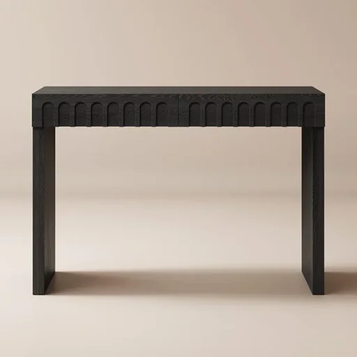 Black wooden console table with ornate leg detailing against a beige background.